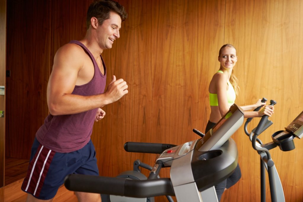 Couple on a treadmill at home