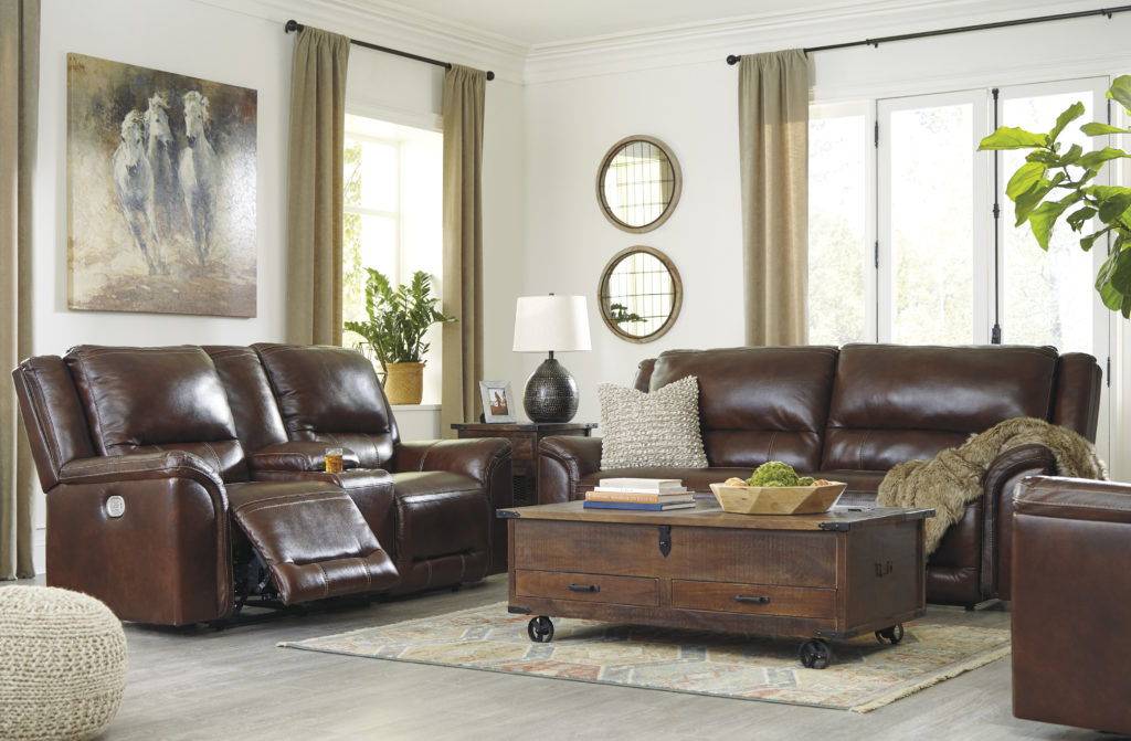 Spruce Up Your Signature Design Leather Couch to Make it Feel Cozy