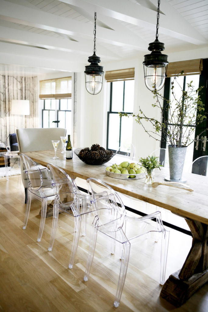 Ghost-chairs-at-rustic-wood-dining-table