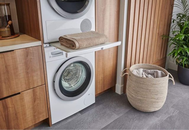 bosch stackable washer and dryer in a laundry room