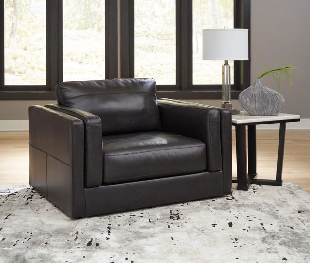 front view of a black leather contemporary oversized chair