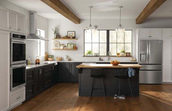 Premium Kitchen Appliance Package Modern kitchen featuring a Frigidaire Gallery stainless steel counter-depth French door refrigerator and coordinating appliances