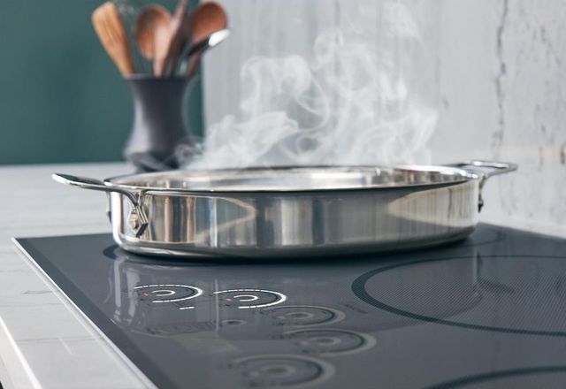 Café™ 30" Flagstone Gray Induction Cooktop lifestyle