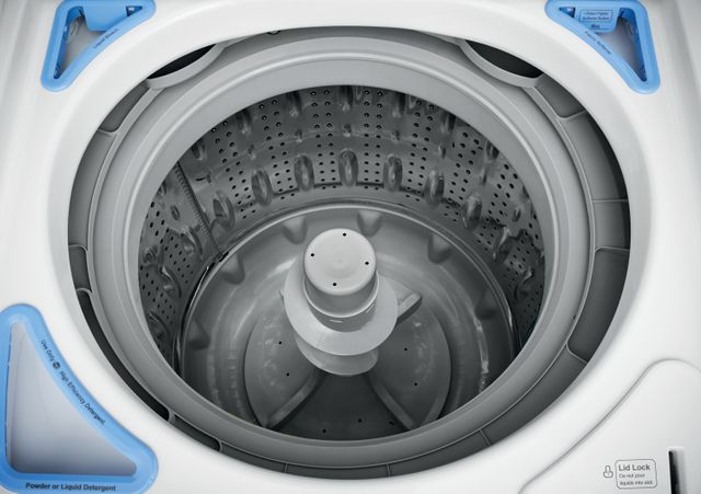top view of the inside of an high efficiency washing machine