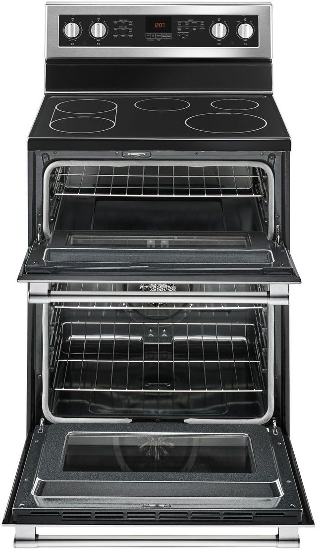 Maytag electric range with open oven doors