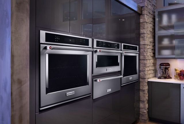 KitchenAid® 1.4 Cu. Ft. Stainless Steel Built In Microwave lifestyle image