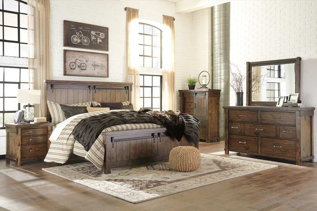 front view of a farmhouse rustic bedroom with a dresser with mirror and a matching bedroom set