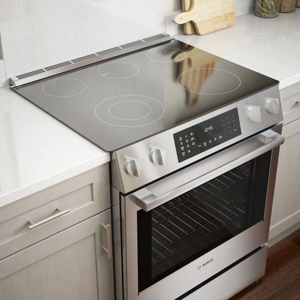 Kitchen Showcasing Frigidaire Gallery 30" Stainless Steel Slide In Induction Range