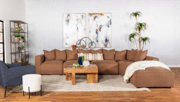 front view of a modern living room with a brown modular sectional sofa