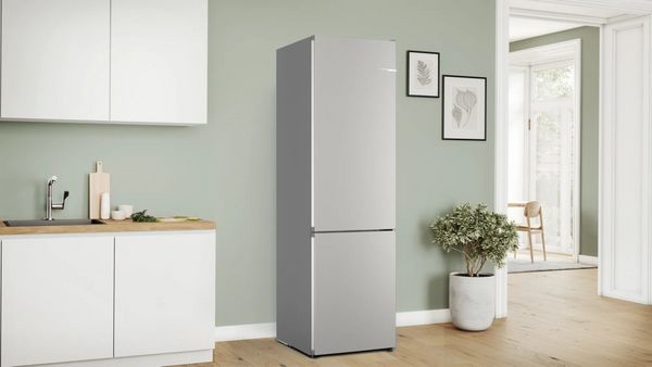 Kitchen Featuring Bosch 500 Series 12.8 Cu. Ft. Easy Clean Stainless Steel Compact Refrigerator