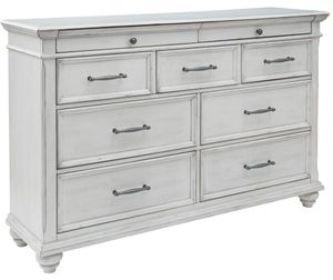 front view of the https://www.blvdhome.com/product/benchcraft-kanwyn-whitewash-dresser-b777-31-275346
