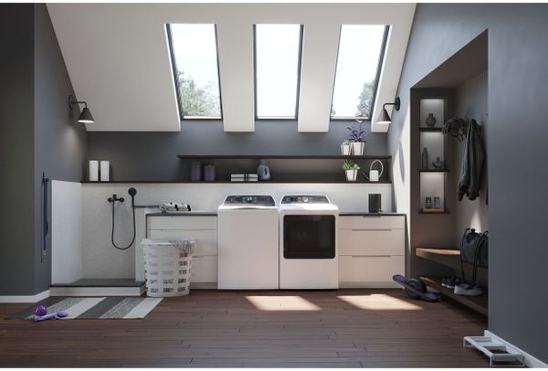 Laundry room featuring a GE washer and dryer