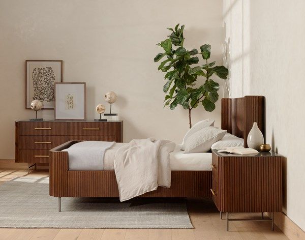 side view of a mid-century modern bedroom with all Four Hands furniture pieces