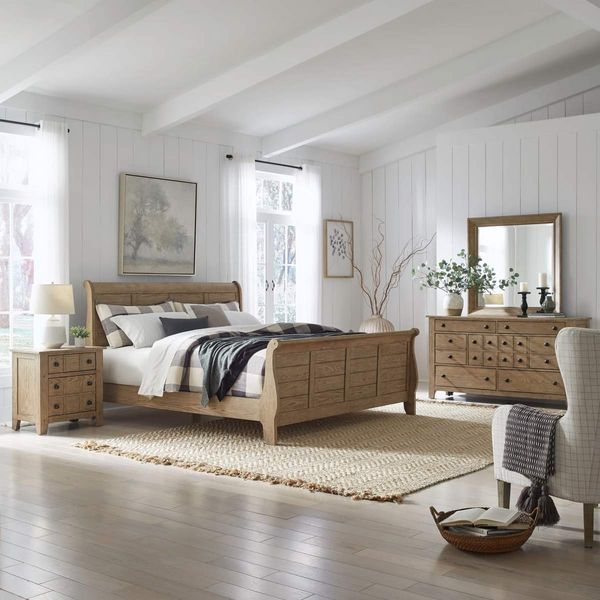 front view of a modern bedroom with matching wood furniture