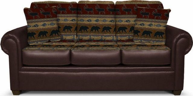 front view of a brown sofa sleeper with a western-american style pattern on the back cushions and pillows