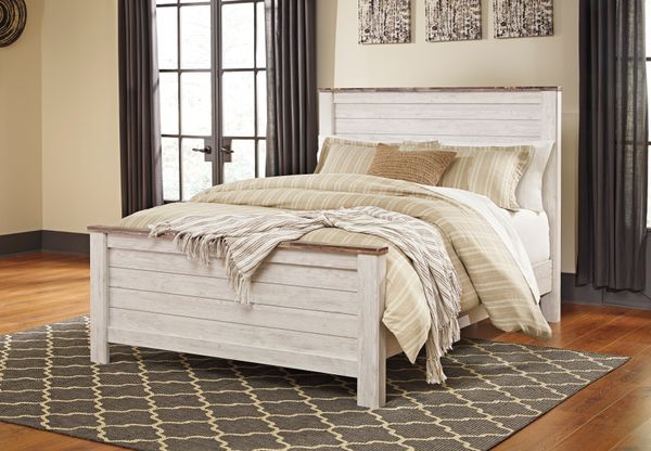 front view of a white farmhouse panel bed