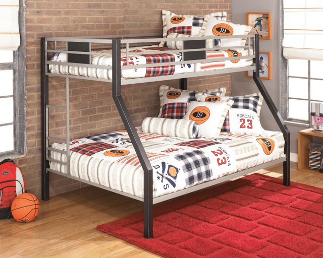 front view of a twin over full metal bunk bed with sports-themed bedding
