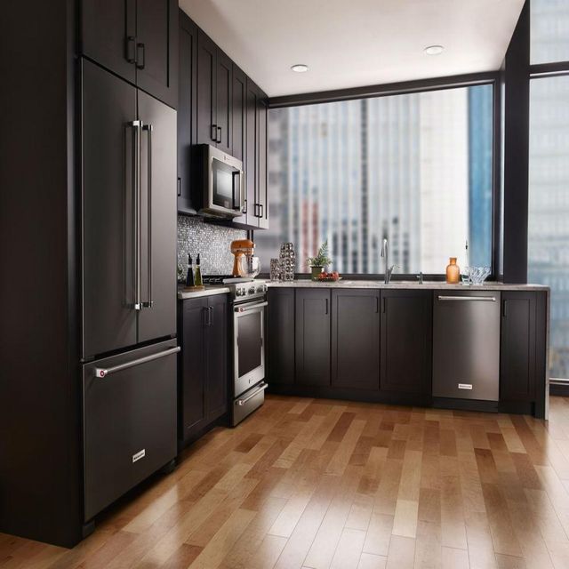 front view of a sleek black kitchen with black appliances and a 33 inch french door refrigerator