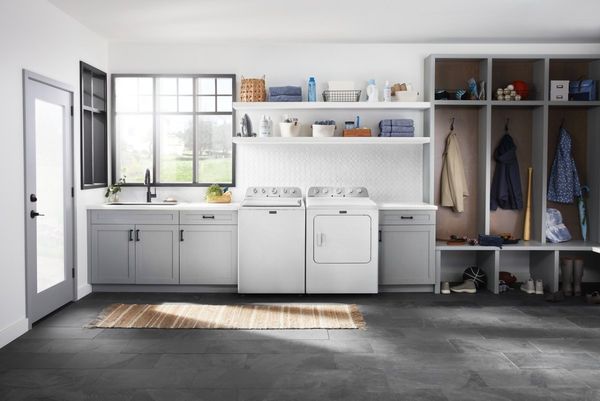 ndry Room Featuring a Maytag 7.0 Cu. Ft. White Front Load Gas Dryer and Washer