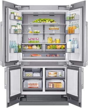 front view of an opened and stocked Dacor® 23.5 Cu. Ft. Panel Ready Built In French Door Refrigerator