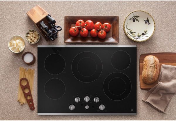kitchen Featuring a GE 36" Stainless Steel Built In Electric Cooktop
