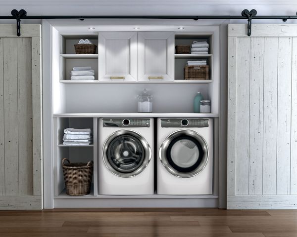 Laundry Room Featuring Electrolux 8.0 Cu. Ft. Island White Front Load Electric Dryer and Washer