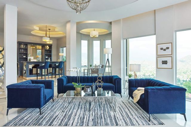 front view of a contemporary living room with royal blue sofas