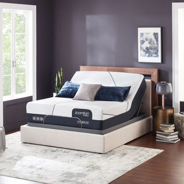view of an adjustable bed base with a serta icomfort mattress in a modern bedroom