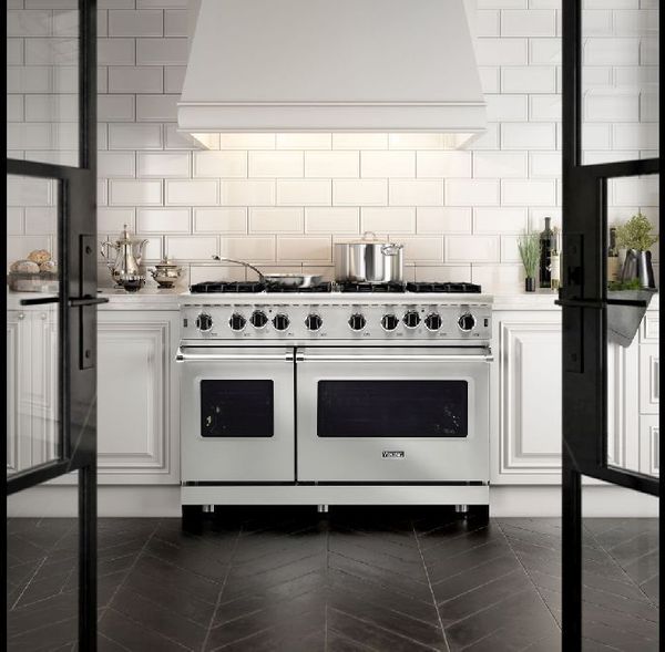Kitchen Featuring a Viking 5 Series 48" Stainless Steel Freestanding Liquid Propane Range