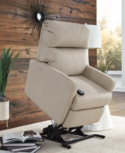 front view of a standing beige lift chair