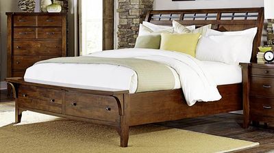 front view of the Retreat King Bed in a rustic bedroom