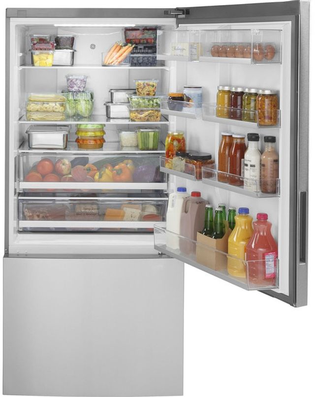 GE Bottom Freezer Refrigerator open with food