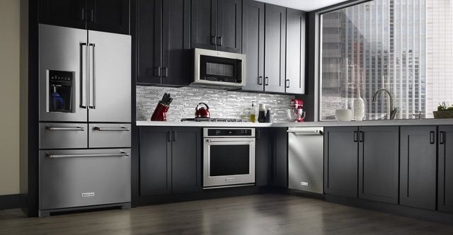 front view of a standard depth 5-door refrigerator in a modern luxurious kitchen