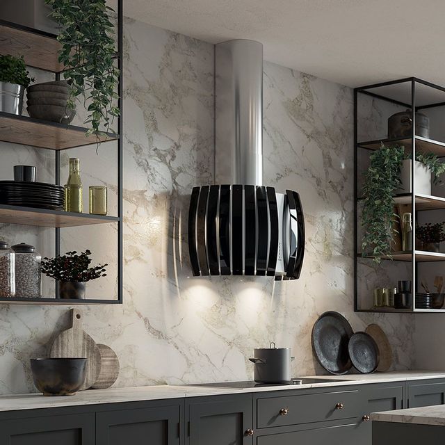 front view of the Falmec Design Collection 30" Black Island Range Hood in a modern black and white luxury kitchen with a marble backsplash