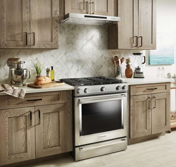 Kitchen Featuring a KitchenAid 30" Stainless Steel Slide In Gas Range