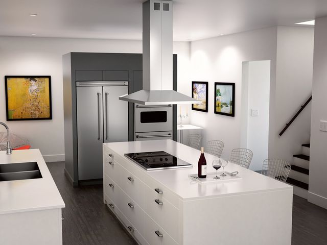 view of a modern white kitchen with a white island and a large stainless steel island range hood above