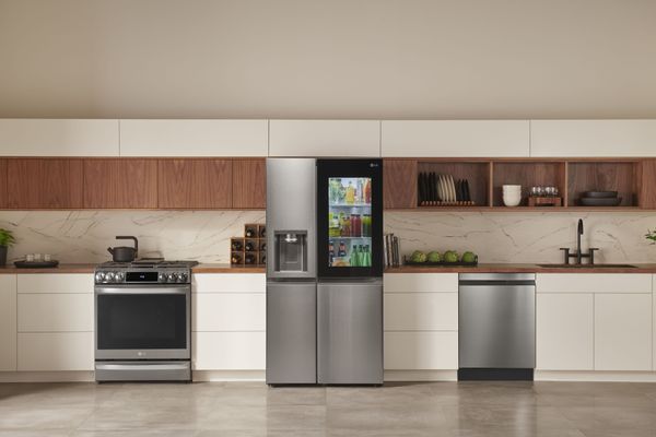 Kitchen Featuring an LG 27.1 Cu. Ft. PrintProof Stainless Steel Side-by-Side Refrigerator