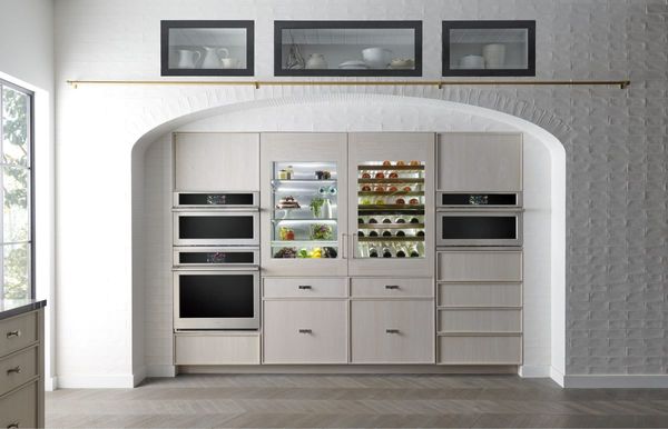 Kitchen showcasing Monogram appliances including oven, wine cooler and a microwave