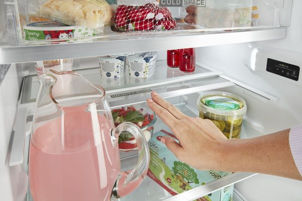 Inside a Whirlpool 11.6 Cu. Ft. Fingerprint-Resistant Stainless Top Freezer Refrigerator