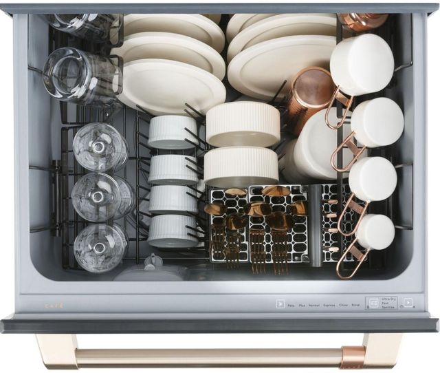 Interior of a Cafe drawer dishwasher loaded with dishes
