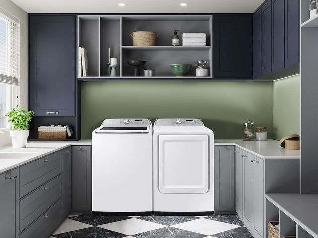 front view of a white samsung washer and dryer in a modern grey laundry room