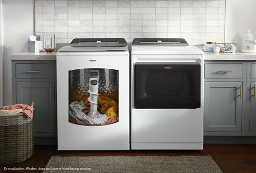 Laundry Room Featuring Whirlpool 5.2 - 5.3 Cu. Ft. 2 in 1 Removable Agitator White Top Load Washer and Dryer