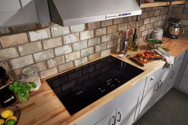 Kitchen Featuring a KitchenAid 36" Black Electric Cooktop