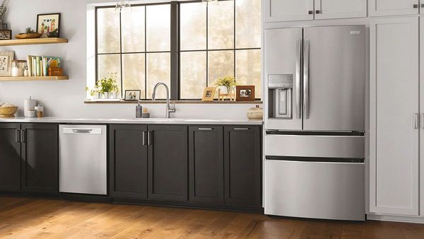 Kitchen Showcasing a Frigidaire Gallery 26.3 Cu. Ft. Smudge-Proof Stainless Steel 4-Door French Door Refrigerator