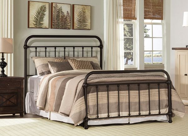 front view of a metal bed in a casual bedroom