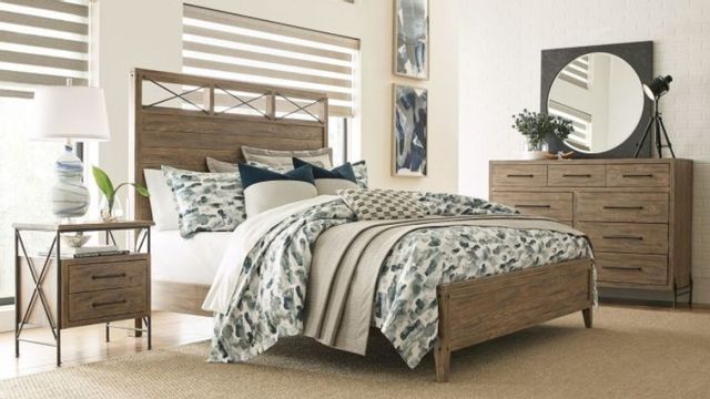 front view of a transitional wood bed frame with a matching side table and dresser in a transitional bedroom