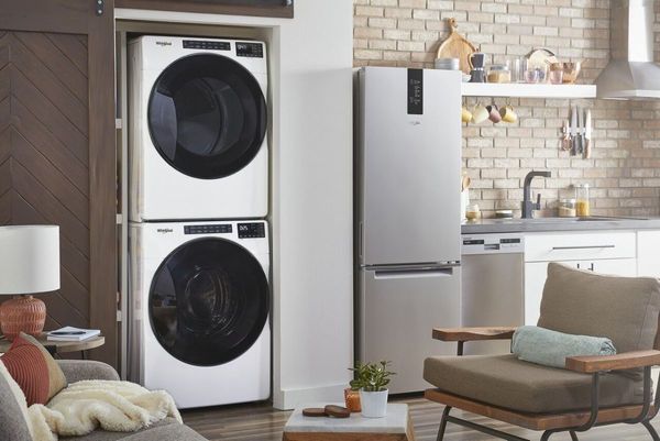 Laundry Room Showcasing a Whirlpool® 5.0 Cu. Ft. White Front Load Washer