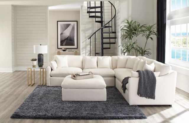 front view of a white sectional in a modern living room