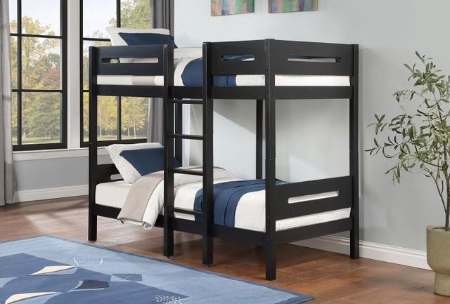 front view of a black wood twin over twin bunk bed in a modern minimal room with light blue walls