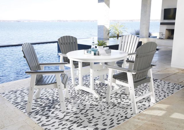 front view of a plastic outdoor dining table on waterfront patio